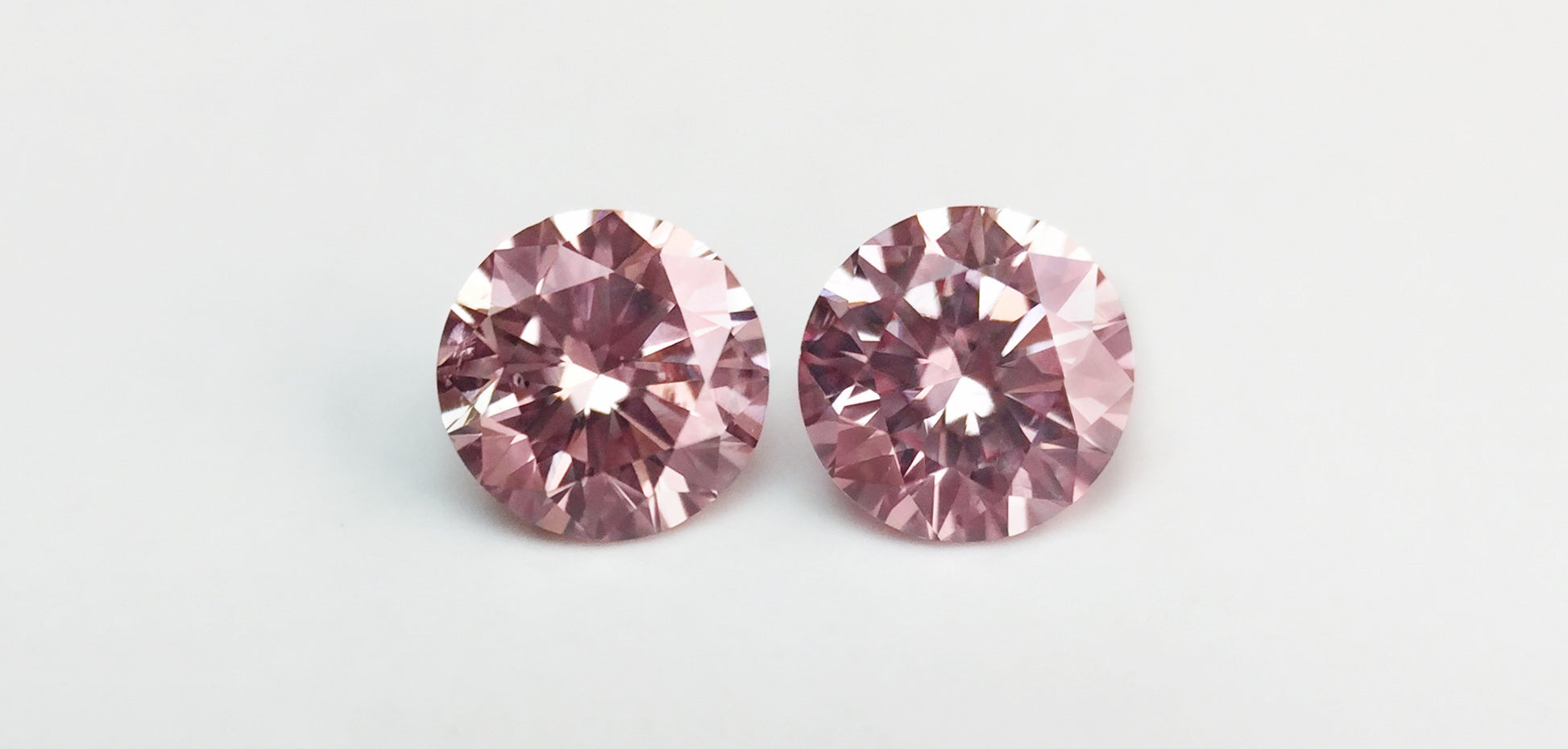 Pair of 0.36ctw Fancy Intense Pink Diamonds, Round Shape, SI2/SI1, Argyle & GIA